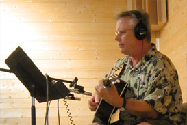 Dan Drilling of Panda Productions of Nashville playing guitar in the studio